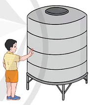 A child touching a large cylindrical container

Description automatically generated