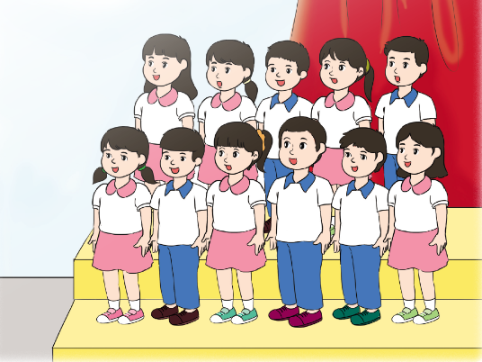 A group of children standing on a stage

Description automatically generated